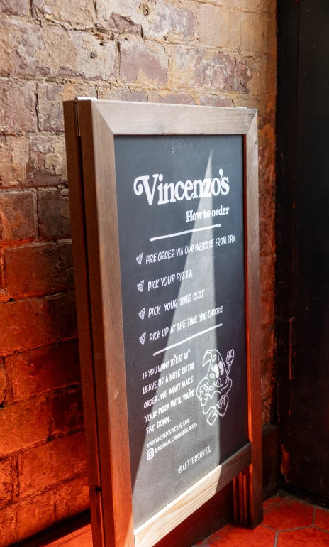 Vincenzo's sign - @eatkickfoods Instagram